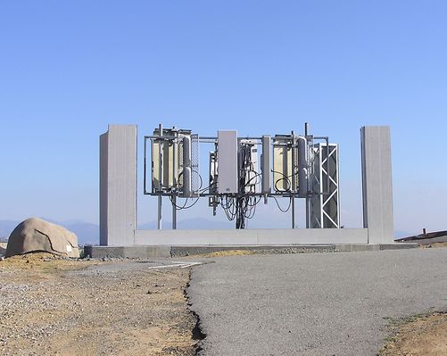 Wireless Sign
This uncompleted sign framework holds multiple antennas.  Note that the 'rock' to the left is a cellular rock housing Nextel's antennas. Rocky peak site in Santa Susana Pass, California.  
