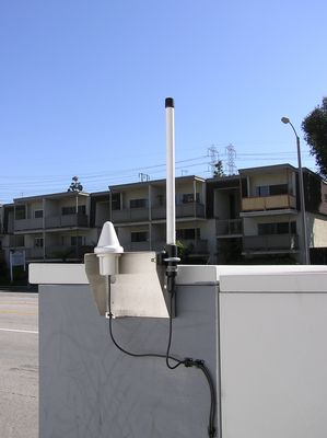 Close-up of GPS Antenna and LMU Antenna
Cingular's GPS antenna (left) and the LMU antenna are mounted at about the 5 foot level adjacent to the sidewalk.  It's amazing that they're still there.  Hope no pedestrians walk into the bracket at night.
Keywords: cingular gps lmu