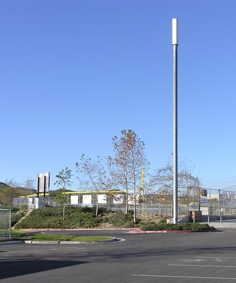 Sports park monopole
Cingular is responsible for this site.  The BTS equipment is located below/behind the score board (left side of photo).  This might have been a good site for a cell-flag instead of just a 'plain old' monopole.
