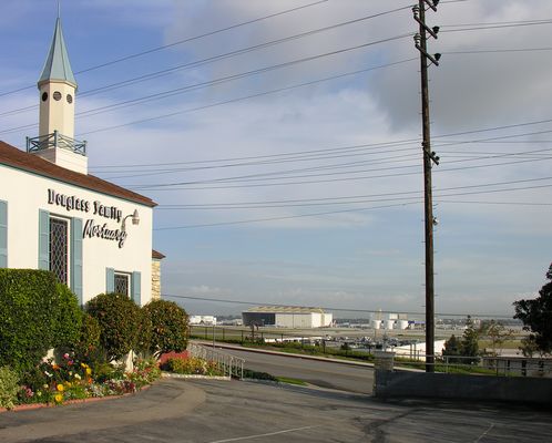 Faux Steeple Site Overlooking LAX
This Cingular-built site in El Segundo, California, now owned by T-Mobile, overlooks LAX.  The building houses a mortuary.  In this picture you see the relationship between the site and the west complex of LAX.  This is a $million dollar view of LAX, but I suspect the mortuary isn't quite making all that from T-Mobile.
Keywords: cingular t-mobile lax el segundo faux chimney steeple