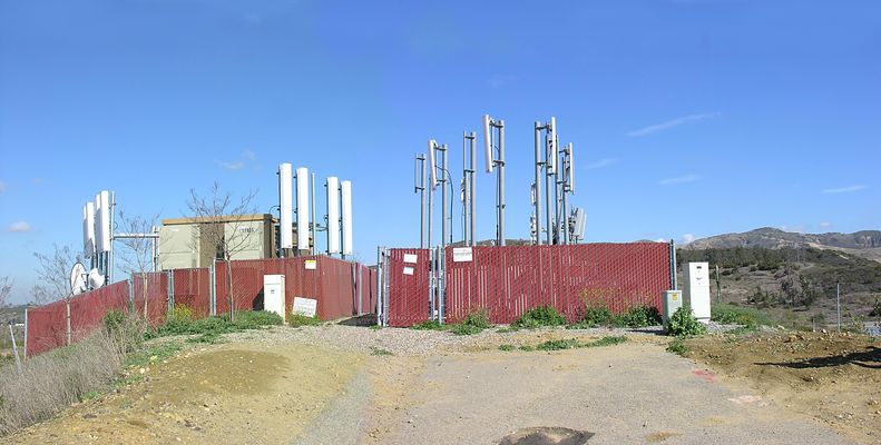 Lambert Ranch - Irvine, California
This view shows the separate fences for the varioud sites.  Notice that the walkway between the Nextel site (left) and the Sprint site (middle, foreground) passes right under the various panels.
Keywords: lambert ranch irvine verizon nextel sprint