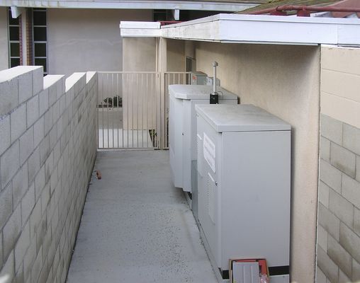 BTS Equipment at Church
This is a view of Cingular's BTS equipment installed at a church in Irvine, California.  Notice that the GPS antenna, used to providing timing synch, is [b]under the eve[/b] of the building.
Keywords: Cingular bts gps