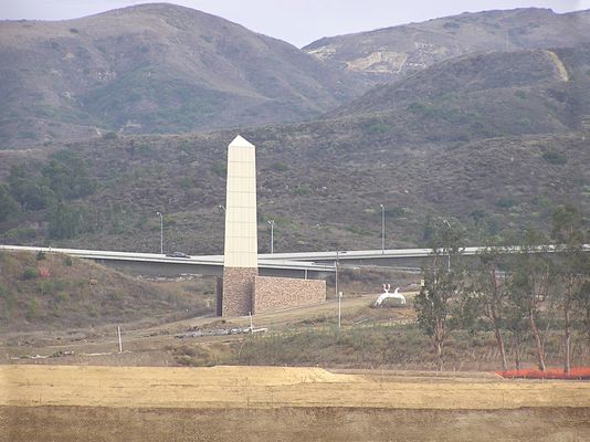 Obelisque du Signal
This cellular Obelisque is located at the interchange of California SR241 and SR133 in the City of Irvine, Calfornia.  A similar but smaller wireless obelisque is located at The Spectrum in Irvine (a photo is on this site).  

This view is looking to the east from Portola Road.
Keywords: obelisque irvine