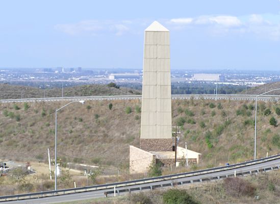 Obelisque du Signal
This cellular Obelisque is located at the interchange of California SR241 and SR133 in the City of Irvine, Calfornia.  A similar but smaller wireless obelisque is located at The Spectrum in Irvine (a photo is on this site).  

This view is looking to the west from the northbound SR241 just before the interchange.
Keywords: obelisque irvine