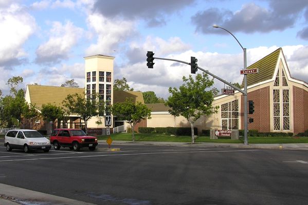 Camo site atop standalone church tower
This church, in Irvine, California, has a Cingular site above the stained glass in the stand-alone tower.
Keywords: cingular camo church tower