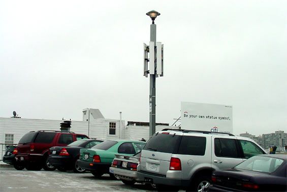 Parking lot cell site
Here's another, wider view of a cell site mounted on a parking lot light standard in San Francisco.
Keywords: parking lot cell site