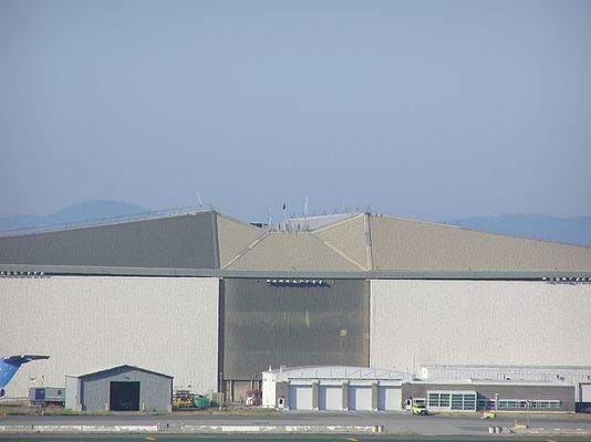 SFO Airport - Superbay Hanger
The cell antennas are mounted on the roof of the Superbay hanger in the top center of the photograph.  
Keywords: sfo airport san francisco superbay hanger
