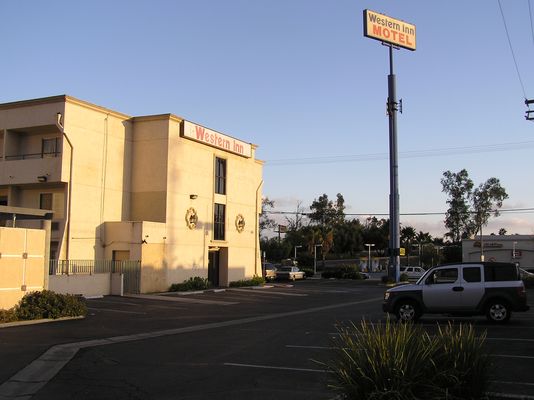 Restful Signal
Here's a non-camo three sector Sprint site located on a motel sign post in Azusa, California.  
Keywords: sprint sign post azusa sector