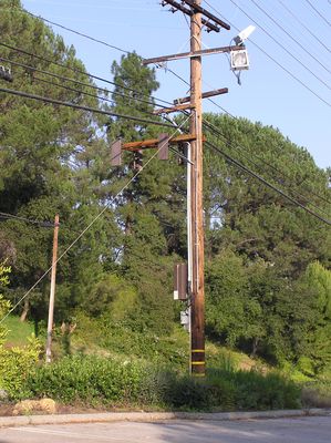 Sprint microcell - Two Sectors
This two sector microcell provides spot service along Mulholland Highway in Los Angeles.  Note the good use of brown paint to provide some blending with the pole and arms.

