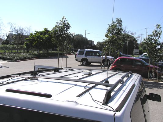 Rover's Roof
On the roof of the drive test 'rover' is a GPS antenna (the square antenna in the center of the roof), plus two PCS omnidirectional antennas for signal measurement and communications purposes.
Keywords: Sprint drive test rover