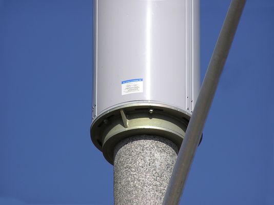 Mounting collar: Radome above a light standard
Here's a close-up view of how a radome is attached to the top of a concrete light standard.  This is a Sprint site in the Newbury Park portion of Thousand Oaks, California
Keywords: sprint newbury park thousand oaks light standard mounting collar radome