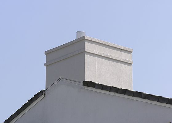 Close-up of a faux 'faux chimney'
Here's a close-up of Cingular's faux chimney on the rear of a real estate office.  Notice how the panel antenna protrudes above the level of the faux chimney.  Not good.
Keywords: cingular tustin california faux chimney real estate remax newport blvd