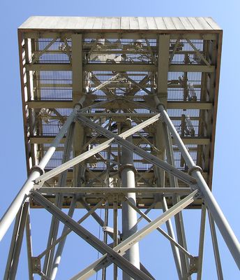 A Mighty Wind's A'blowin...
Looking up to the working platform of the AT&T Wireless Camo Windmill in San Dimas, California.  All three sectors can be seen.  The cables come down the center inside the large pipe.
Keywords: windmill san dimas at&t wireless platform