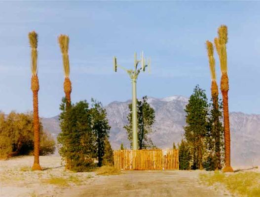 Palms guarding cell site - circa 2001
Here's a photo of a PCS site I photographed sometime in 2001.  Notice that its 'in the middle of nowhere.'  Fast forward to the shot of the same site I took in October, 2004.
