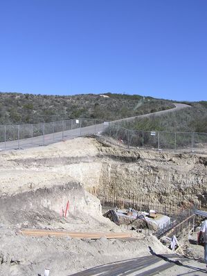 Constructing the underground transmitter building for KMLT-FM
This photograph shows the excavation and initial construction for the underground transmitter building to house KMLT-FM in Thousand Oaks, California.  If you look carefully at the middle of the ridgeline you can just see the antenna and antenna post about 700 feet away.
Keywords: KMLT-FM