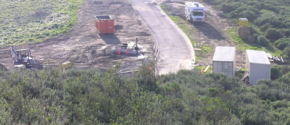 View of the transmitter site from near the antenna site
Here's an updated view of the KMLT transmitter area take from about 600 fee up the hill (very near the antenna site).
Keywords: top down view