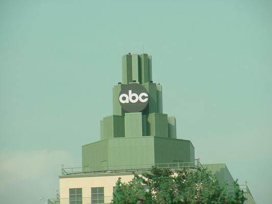 Camo site atop broadcast center
Major network studio in Los Angeles. Transmission facilities hidden behind decorative work on top of the building. 
Keywords: ABC Los Angeles hidden camo wireless
